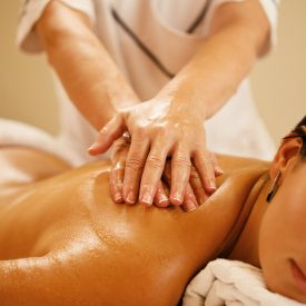 closeup-woman-relaxing-during-back-massage-spa-salon-less